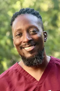 Chiropractic Hillsboro OR Arnell Meet The Team A headshot of Arnell, the office's massage therapist