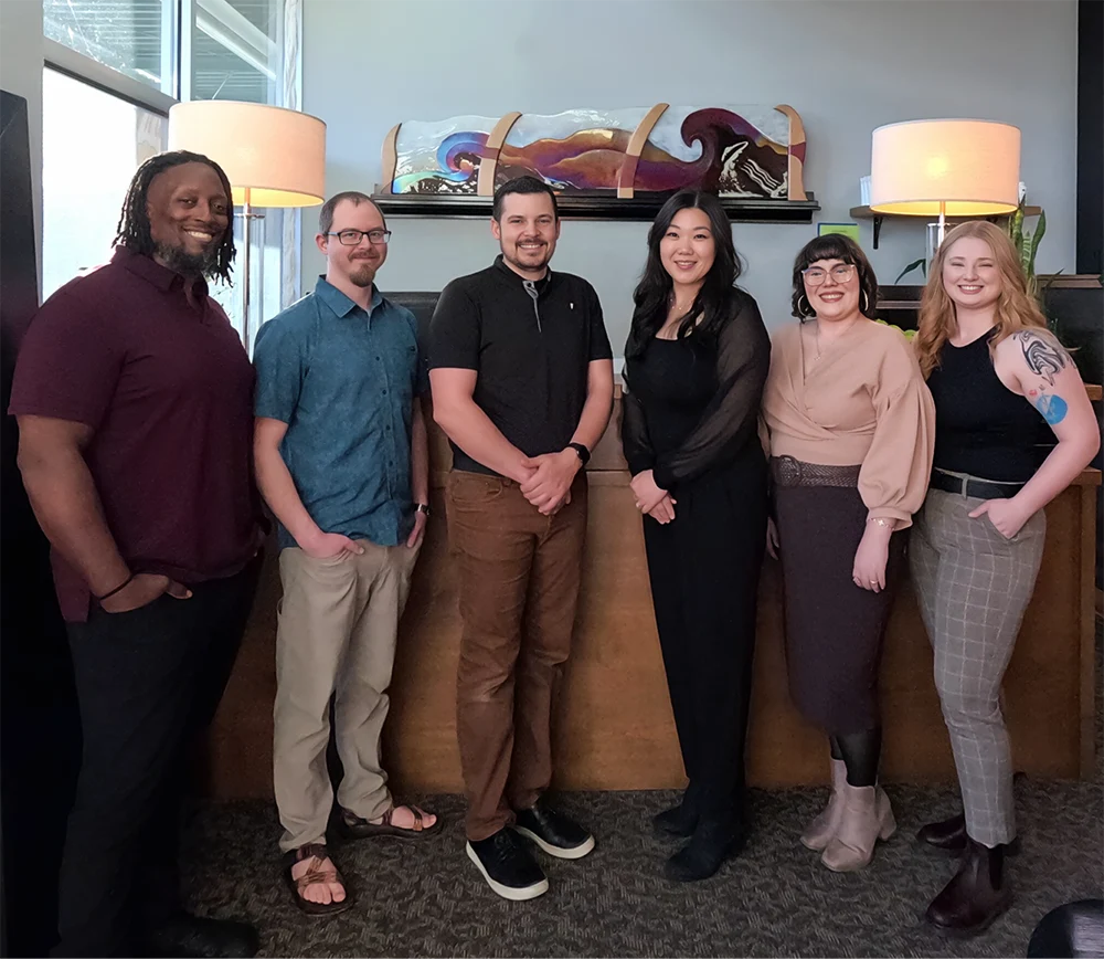 Chiropractor Hillsboro OR Steven Quale and Janet Jun With Team